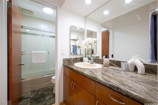 46-058 Aliikane Pl Unit 2114, Kaneohe, HI 96744 - full bathroom featuring toilet, vanity, enclosed tub / shower combo, and recessed lighting