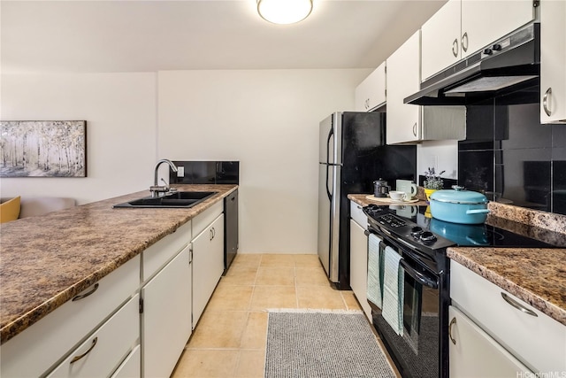 kitchen featuring a sink, under cabinet range hood, white cabinetry, decorative backsplash, and electric range