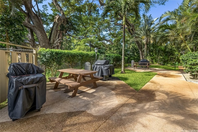 view of patio / terrace featuring fence and area for grilling