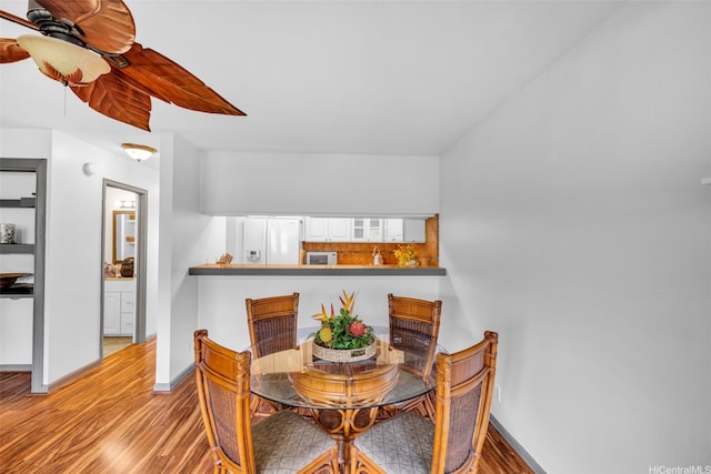1450 S Kihei Rd Unit C204, Kihei, HI 96753 - dining area featuring light wood-style floors and baseboards