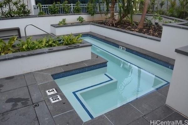 1189 Waimanu St Unit 3502, Honolulu, HI 96814 - view of pool with a pool