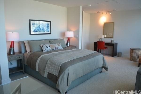 1189 Waimanu St Unit 3502, Honolulu, HI 96814 - bedroom featuring track lighting and carpet floors