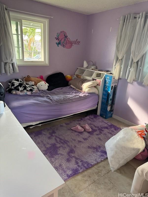 view of tiled bedroom