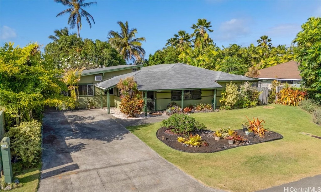 388 Auwinala Rd, Kailua, HI 96734 - single story home featuring a carport, concrete driveway, a front yard, and stucco siding