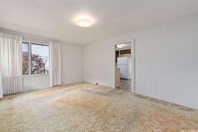 empty room featuring carpet floors