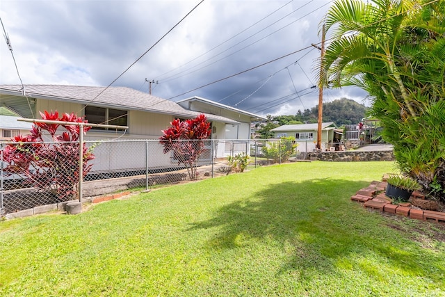 view of yard with fence