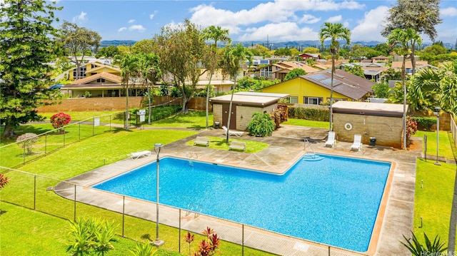 95-046 Hokuiwa St Unit 12, Mililani, HI 96789 - view of pool featuring an outbuilding, a patio area, and a residential view