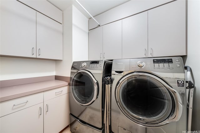 725 Kapiolani Blvd Unit 3503, Honolulu, HI 96813 - washroom featuring washing machine and dryer and cabinet space