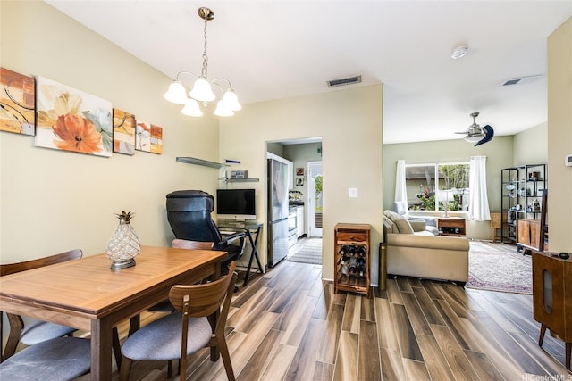 91-1059 Keoneula Blvd Unit F3, Ewa Beach, HI 96706 - dining room with dark wood finished floors, a notable chandelier, and visible vents