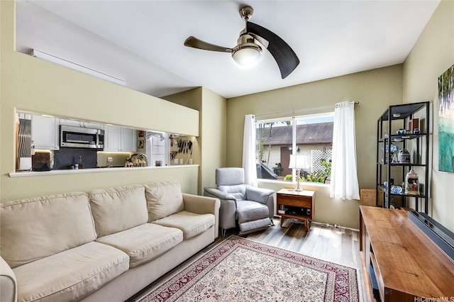 91-1059 Keoneula Blvd Unit F3, Ewa Beach, HI 96706 - living area with wood finished floors and ceiling fan
