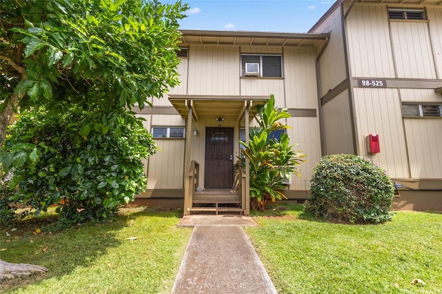 98-525 Kamahao Pl Unit 27, Pearl City, HI 96782 - doorway to property featuring a lawn