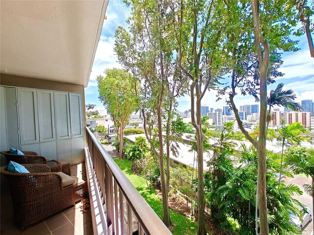 balcony featuring a view of city