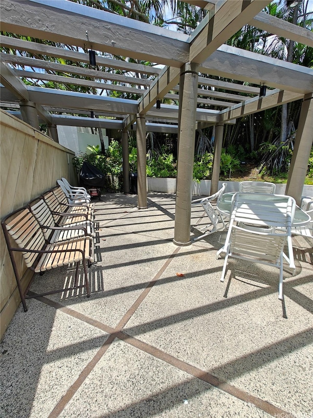 view of patio / terrace featuring a pergola and outdoor dining space