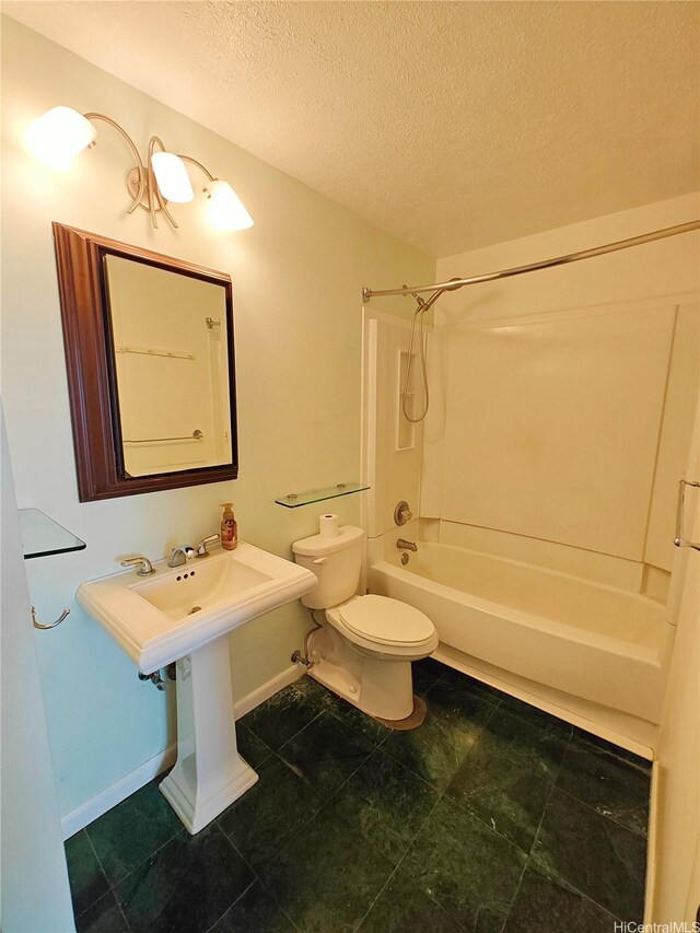 965 Prospect St Unit 307, Honolulu, HI 96822 - bathroom featuring bathtub / shower combination, baseboards, a textured ceiling, toilet, and tile patterned floors