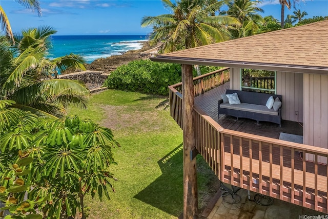 84-215 Makau St, Waianae, HI 96792 - view of green lawn featuring a deck with water view and a beach view