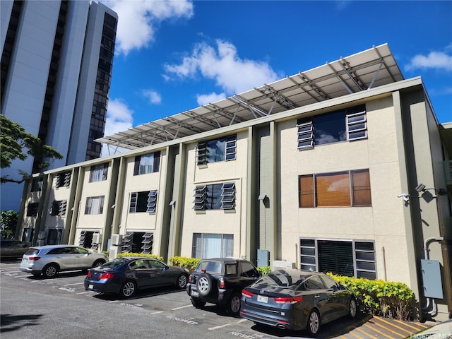 2050 Nuuanu Ave Unit 109, Honolulu, HI 96817 - view of property featuring uncovered parking