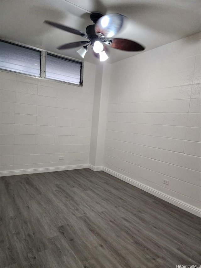 2050 Nuuanu Ave Unit 109, Honolulu, HI 96817 - spare room featuring dark wood-style flooring and ceiling fan