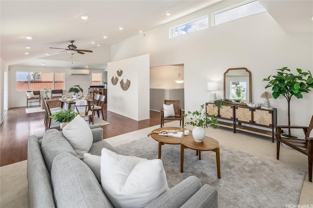 92-1200 Uahanai St, Kapolei, HI 96707 - living room with an AC wall unit, ceiling fan, recessed lighting, wood finished floors, and high vaulted ceiling