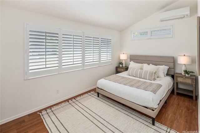92-1200 Uahanai St, Kapolei, HI 96707 - bedroom with vaulted ceiling, a wall mounted AC, wood finished floors, and baseboards