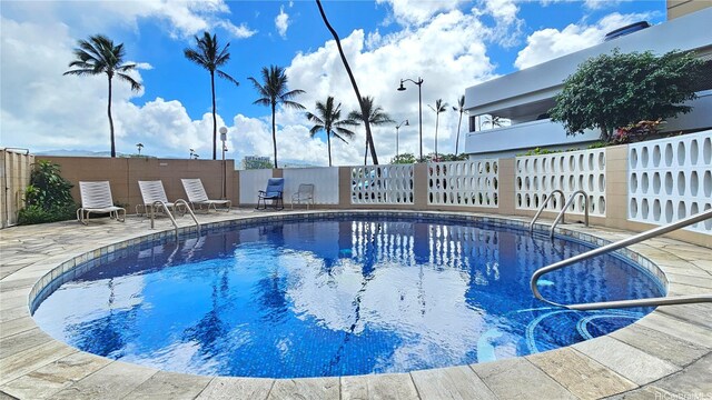 2415 Ala Wai Blvd Unit 1401, Honolulu, HI 96815 - view of swimming pool featuring a patio