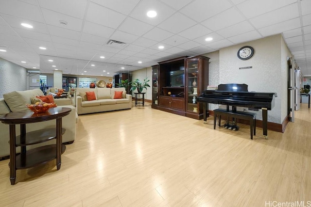 1314 Kalakaua Ave Unit 906, Honolulu, HI 96826 - living area with wood finished floors, a drop ceiling, and baseboards