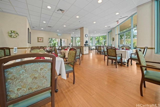 1314 Kalakaua Ave Unit 906, Honolulu, HI 96826 - bedroom with light wood-style flooring and a drop ceiling