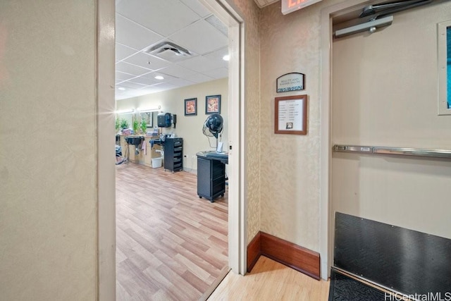 1314 Kalakaua Ave Unit 906, Honolulu, HI 96826 - hallway with wood finished floors, baseboards, and a paneled ceiling