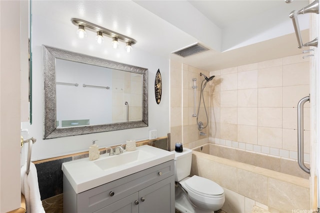 430 Keoniana St Unit 204, Honolulu, HI 96815 - bathroom with toilet, tiled shower / bath, vanity, and visible vents