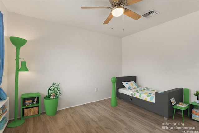 87-307 Panoa St, Waianae, HI 96792 - bedroom with wood finished floors and ceiling fan