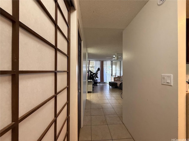 2488 Kapiolani Blvd Unit 403, Honolulu, HI 96826 - hallway featuring tile patterned floors and a textured ceiling
