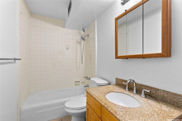 bathroom featuring toilet, shower / tub combination, and vanity