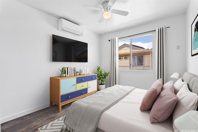 91-241 Makalauna Pl Unit 15, Ewa Beach, HI 96706 - bedroom with a wall mounted air conditioner, wood finished floors, and ceiling fan