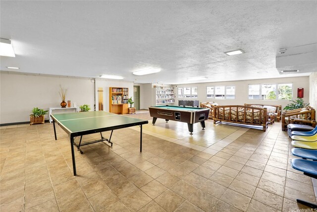 2211 Ala Wai Blvd Unit 1106, Honolulu, HI 96815 - recreation room featuring billiards table and a textured ceiling