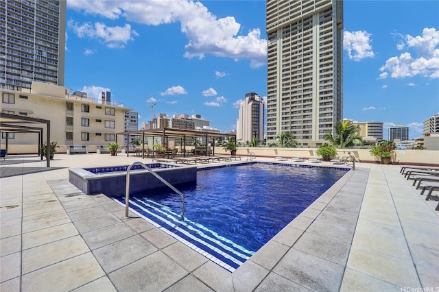 2211 Ala Wai Blvd Unit 1106, Honolulu, HI 96815 - community pool with a view of city and a patio area