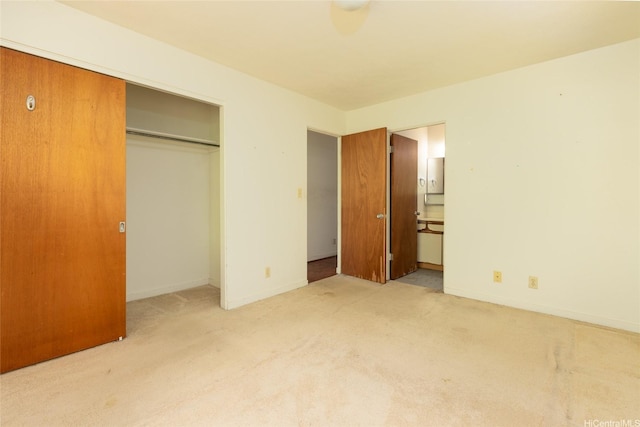 99-611 Alia Pl, Aiea, HI 96701 - unfurnished bedroom featuring ensuite bath, a closet, baseboards, and carpet floors
