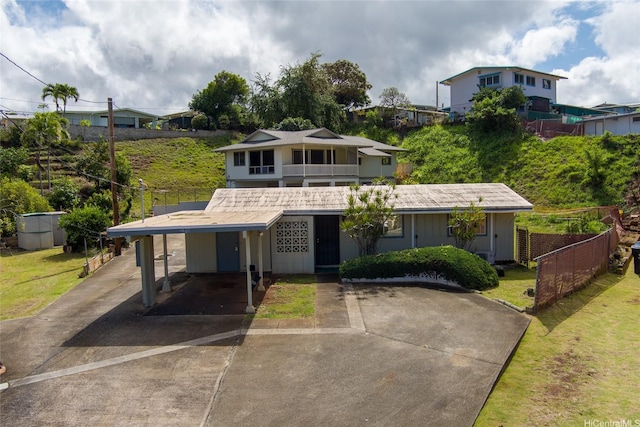 99-611 Alia Pl, Aiea, HI 96701 - view of front of property with a front lawn, fence, and concrete driveway