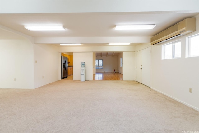 99-611 Alia Pl, Aiea, HI 96701 - empty room featuring light carpet and a wall mounted air conditioner