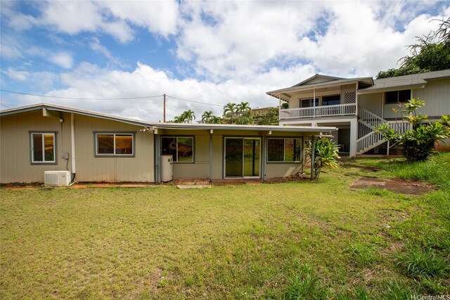 99-611 Alia Pl, Aiea, HI 96701 - back of house with a lawn and ac unit