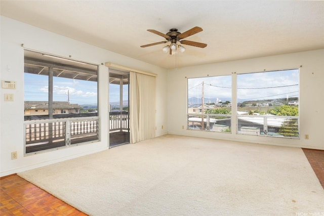 99-611 Alia Pl, Aiea, HI 96701 - unfurnished room featuring ceiling fan, plenty of natural light, and baseboards