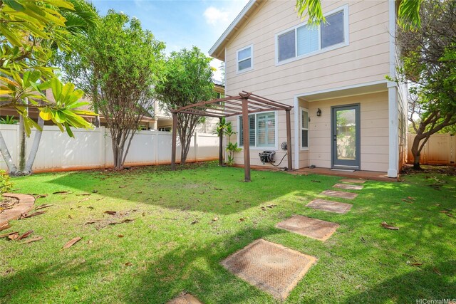 back of property featuring a pergola