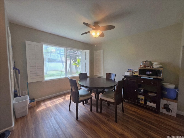 91-1153 Kaileonui St, Ewa Beach, HI 96706 - dining area with dark wood finished floors, baseboards, and ceiling fan