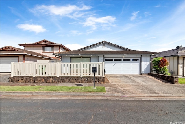 94-1041 Puana St, Waipahu, HI 96797 - view of front of home featuring driveway and an attached garage