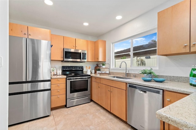 94-1041 Puana St, Waipahu, HI 96797 - kitchen featuring appliances with stainless steel finishes, a sink, light countertops, light tile patterned floors, and recessed lighting