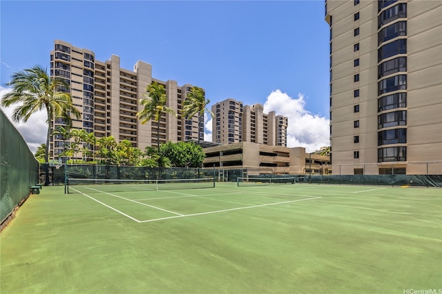 5090 Likini St Unit 501, Honolulu, HI 96818 - view of tennis court featuring fence