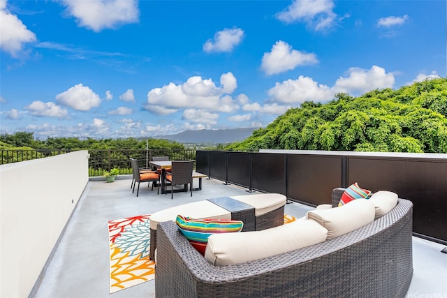 1020 Aoloa Pl Unit 303B, Kailua, HI 96734 - view of patio with outdoor lounge area, a mountain view, outdoor dining area, and a balcony