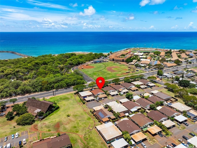 drone / aerial view featuring a residential view and a water view