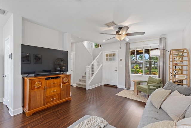 91-1322 Keoneula Blvd Unit 403, Ewa Beach, HI 96706 - living room with stairs, dark wood-style flooring, and a ceiling fan