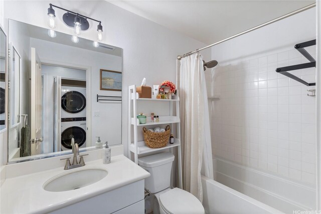 91-1322 Keoneula Blvd Unit 403, Ewa Beach, HI 96706 - full bathroom featuring stacked washing machine and dryer, toilet, shower / tub combo, and vanity