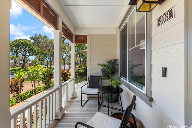 balcony featuring covered porch