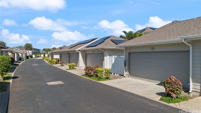 view of road with a residential view